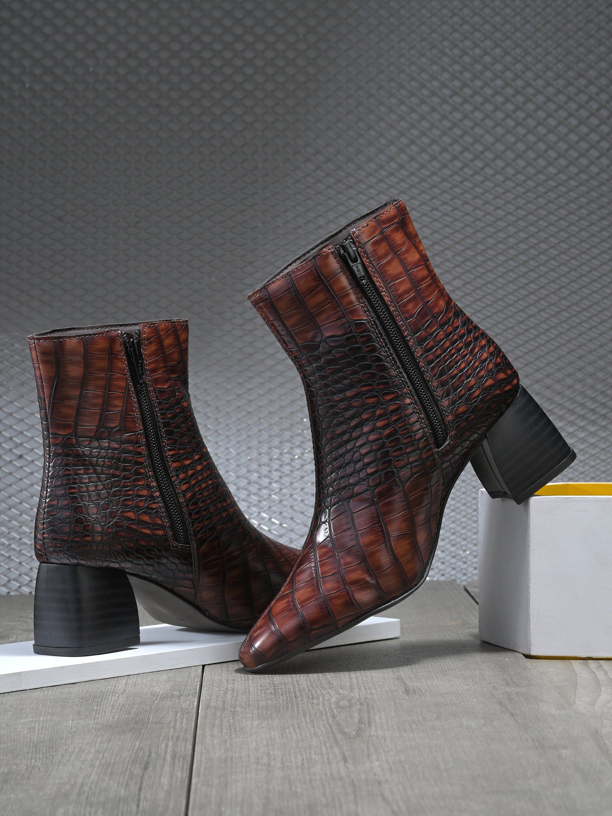 Brown crocodile-patterned high heel boot with a block heel and El Paso branding.