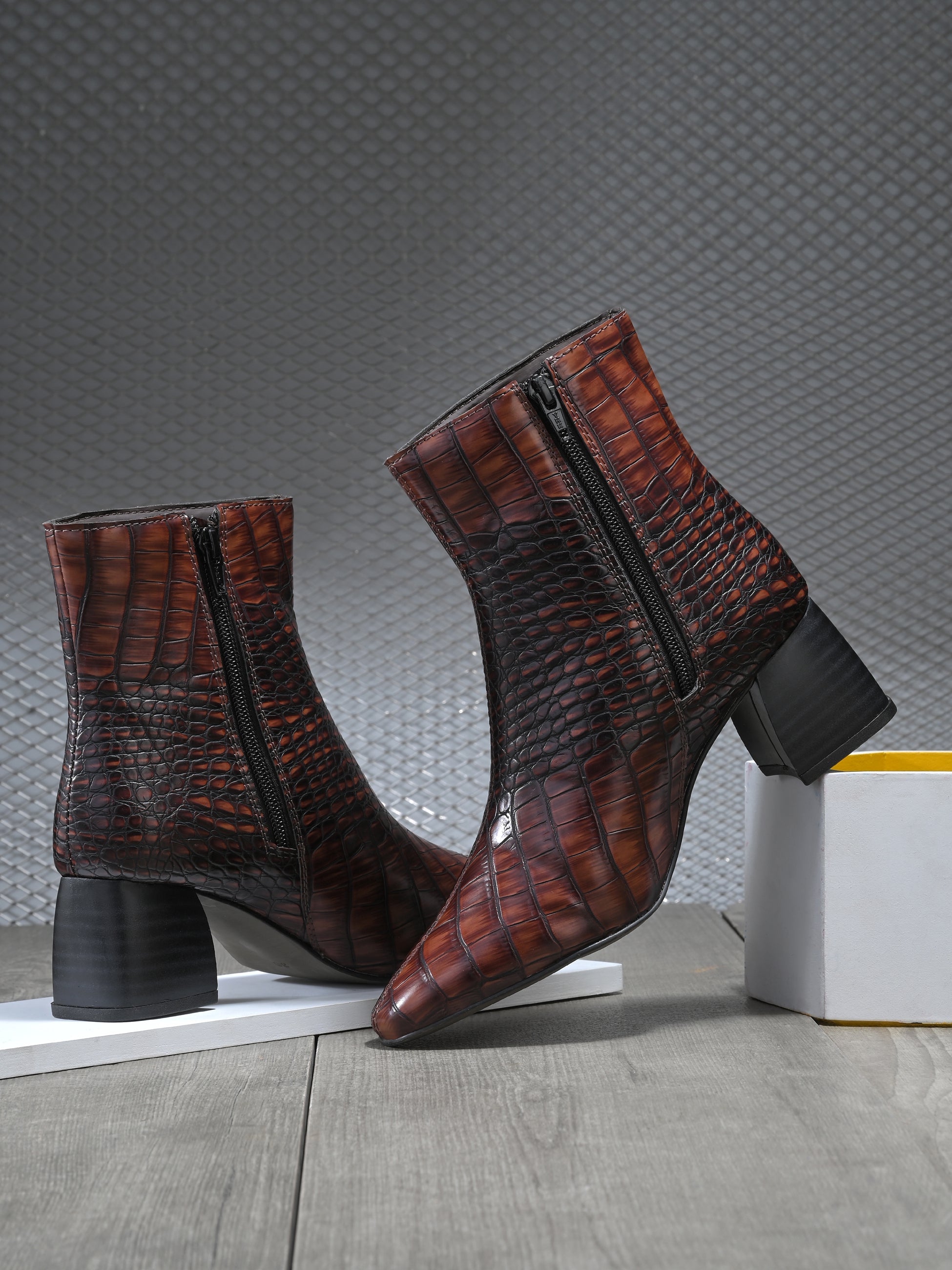 Brown crocodile-patterned high heel boot with a block heel and El Paso branding.