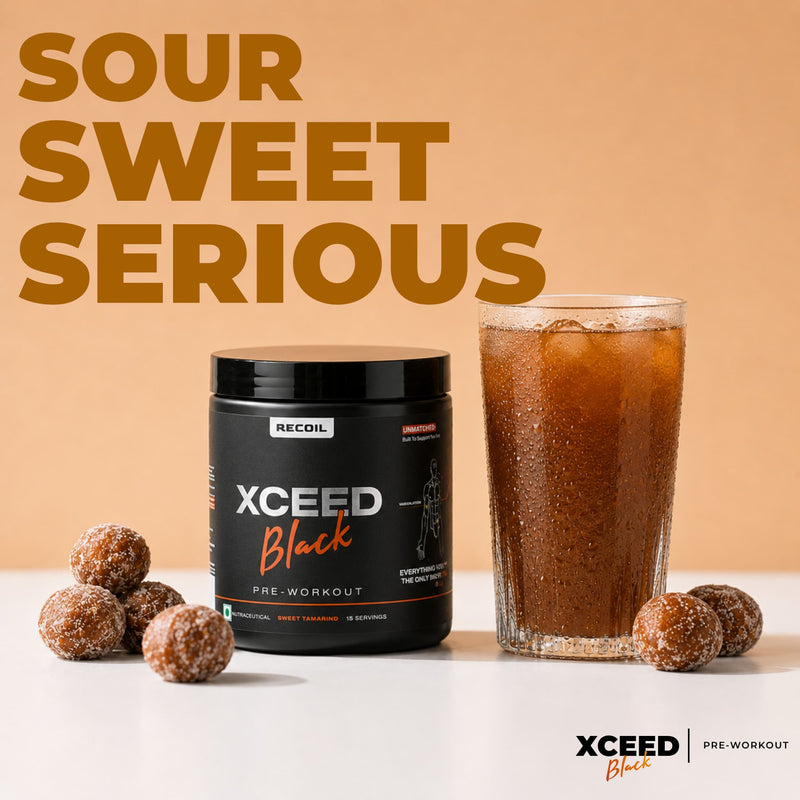 Pre-workout supplement container with a glass of iced drink and gummies on a light background