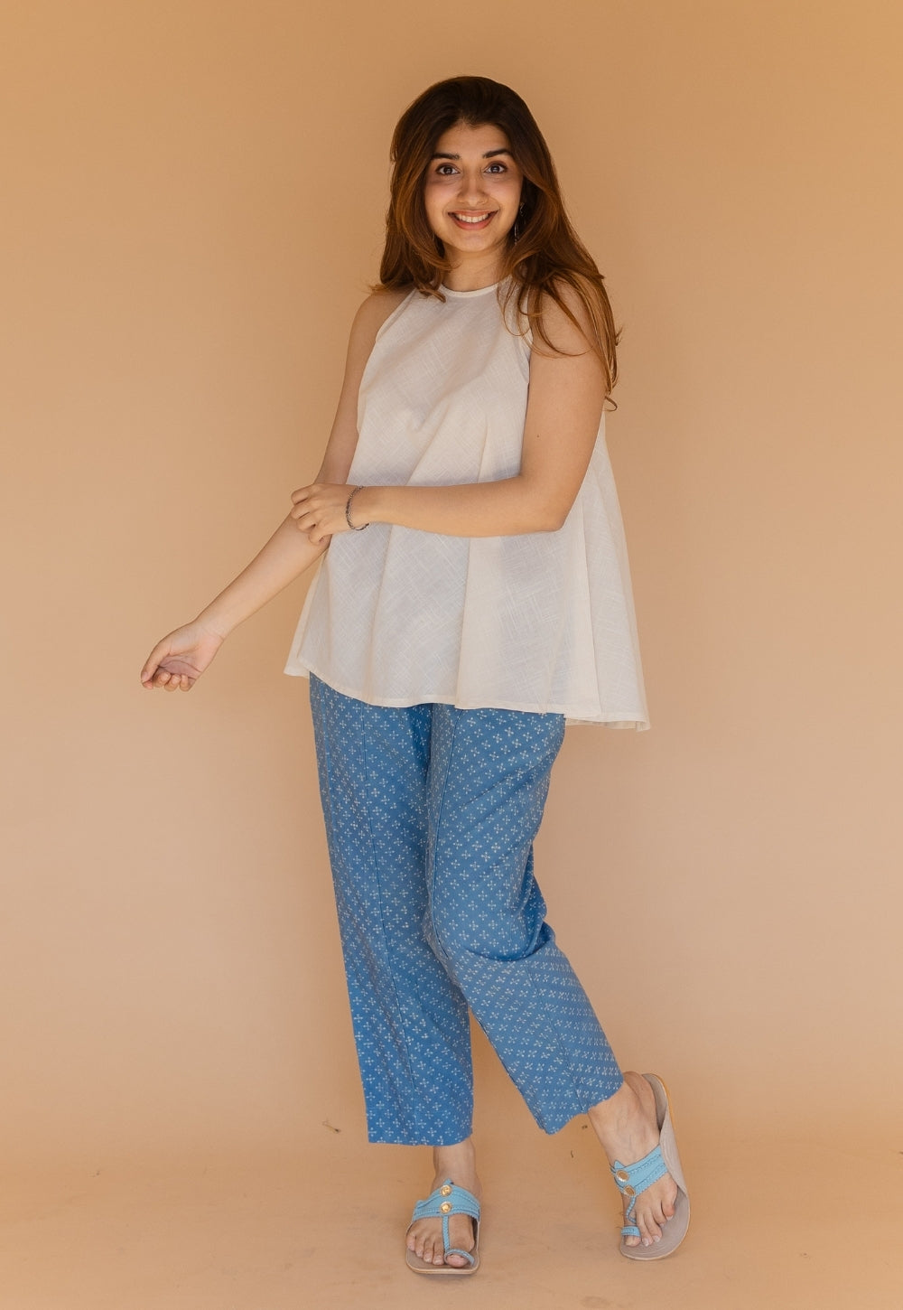 Parveen Off White Solid Slub Cotton A Line Short Top