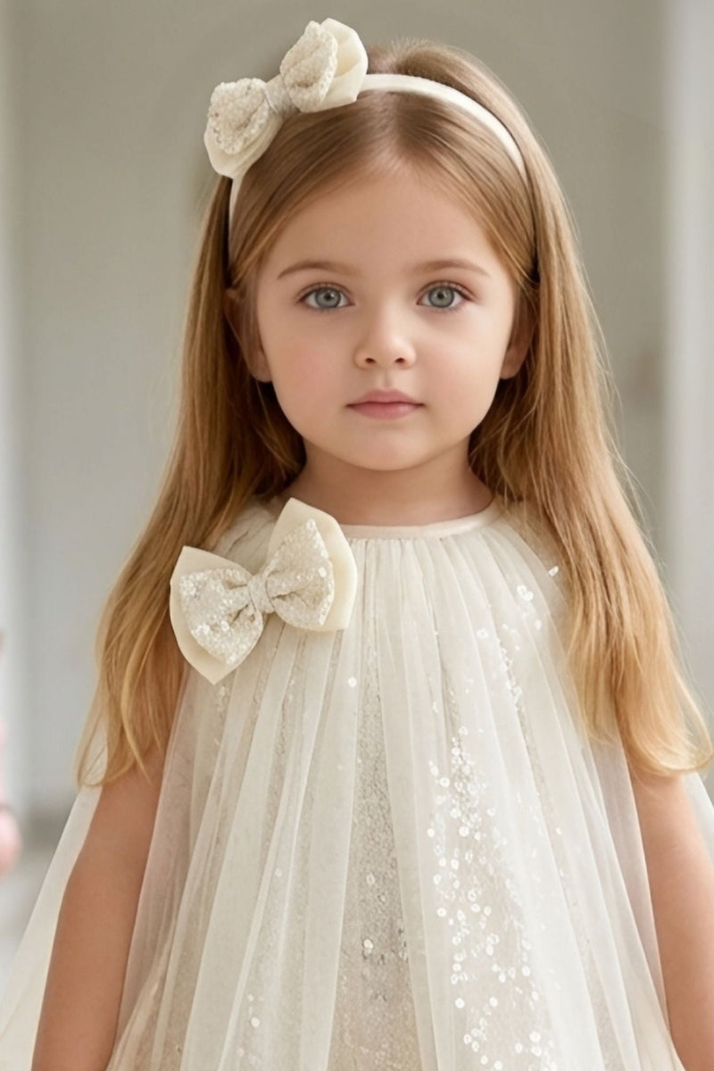 Girls Cream Net Party Dress with Ruffle Hem and Bow Detail