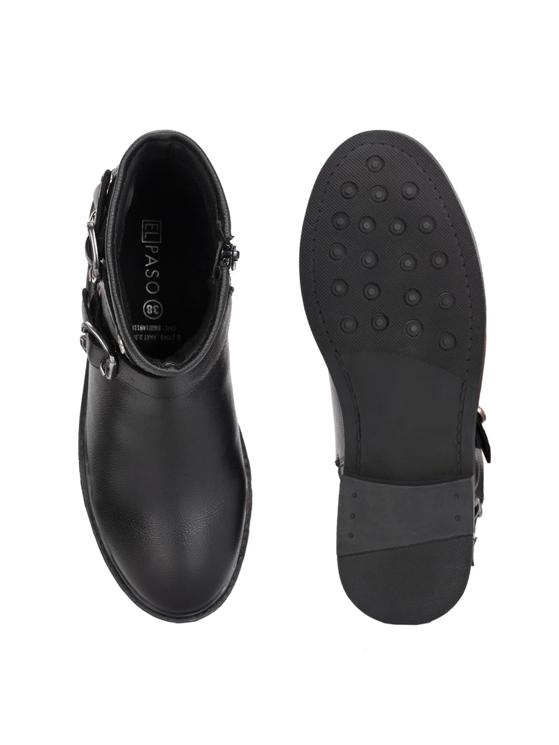 Black ankle-length boot with silver buckle accents and a low heel, perfect for casual or semi-formal wear.