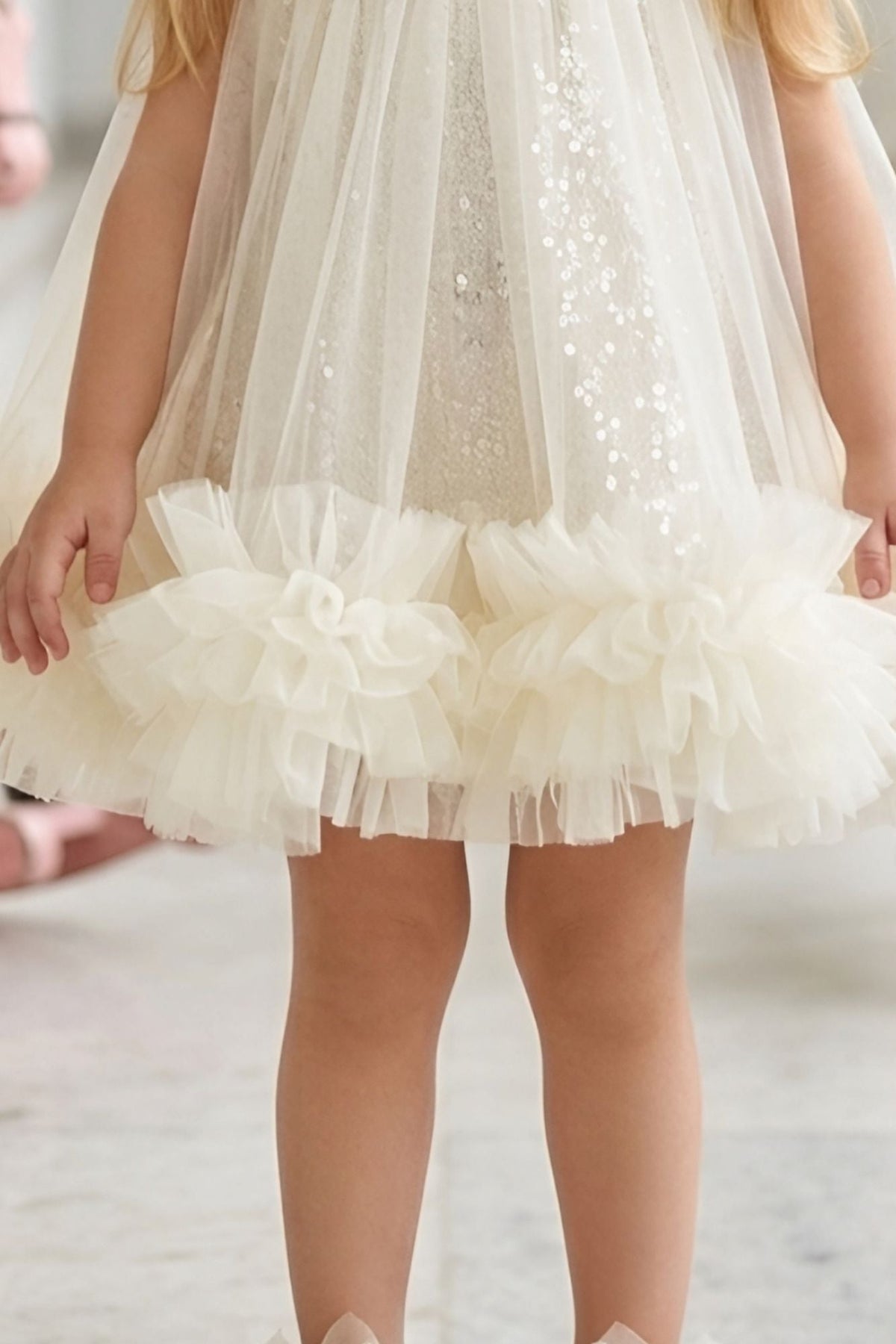 Girls Cream Net Party Dress with Ruffle Hem and Bow Detail