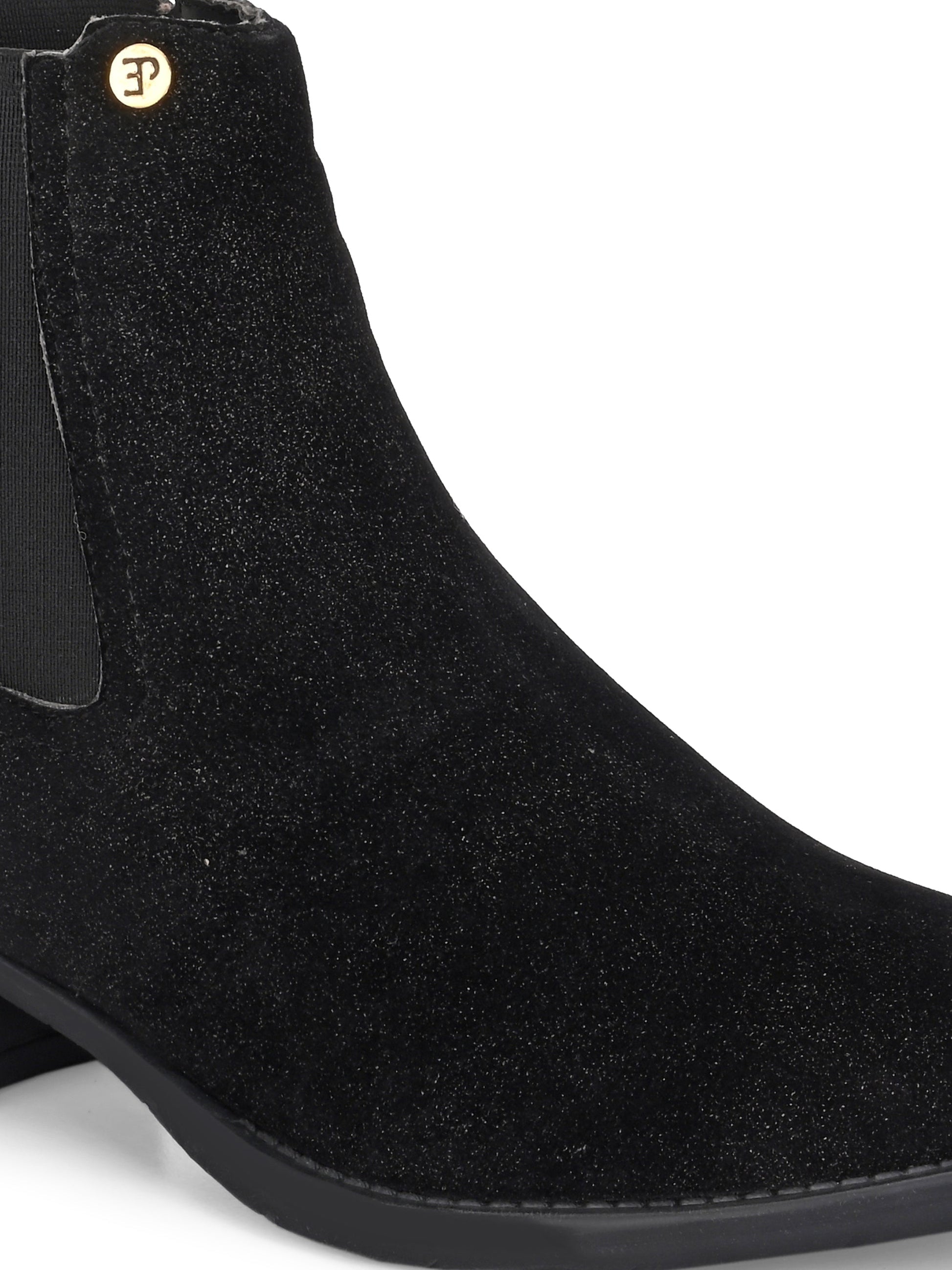Charcoal suede slip-on boots with elastic side panels and a low block heel, featuring subtle gold detailing for a sleek, versatile look