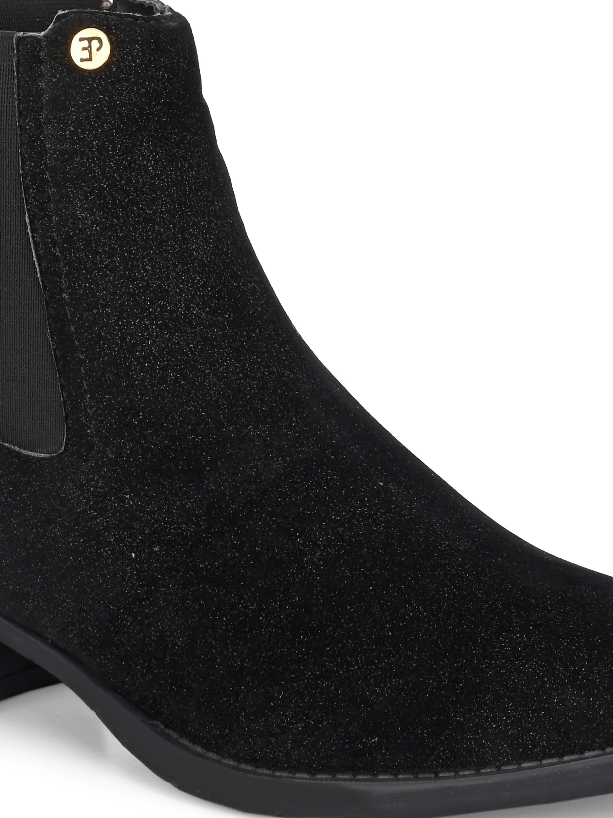 Charcoal suede slip-on boots with elastic side panels and a low block heel, featuring subtle gold detailing for a sleek, versatile look