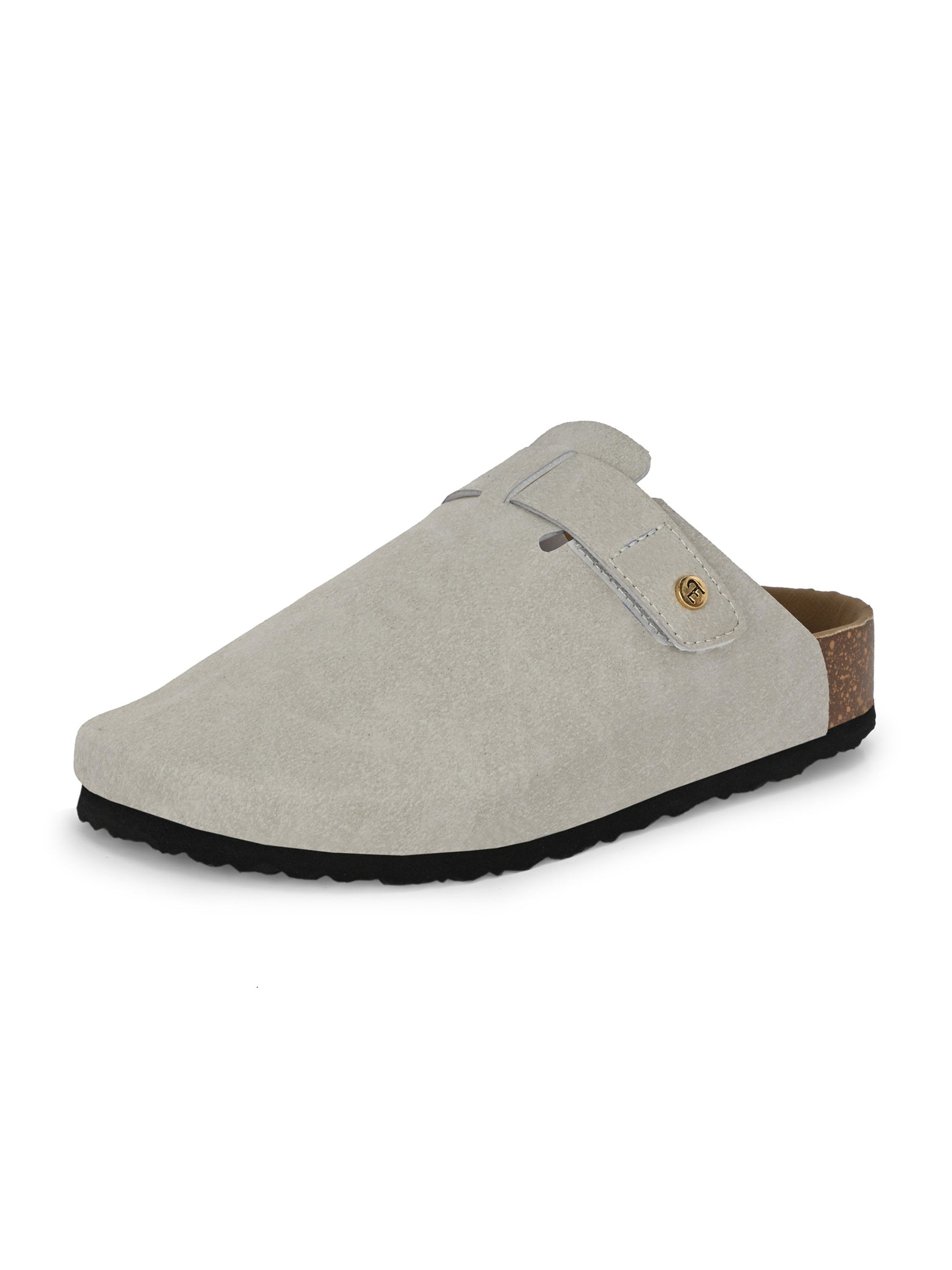 Nude suede slip-on clog with a black rubber sole and adjustable strap.