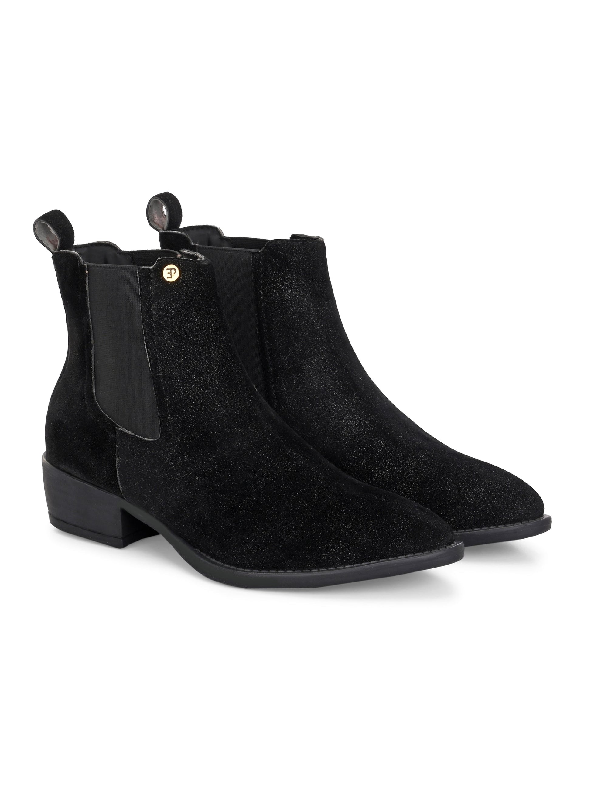 Black suede Chelsea boots with elastic side panels and a low block heel, featuring subtle gold detailing for a sleek, versatile look.