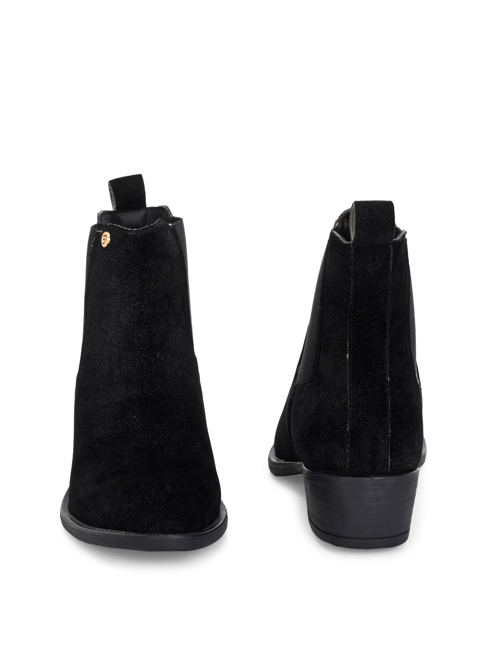 Charcoal suede slip-on boots with elastic side panels and a low block heel, featuring subtle gold detailing for a sleek, versatile look
