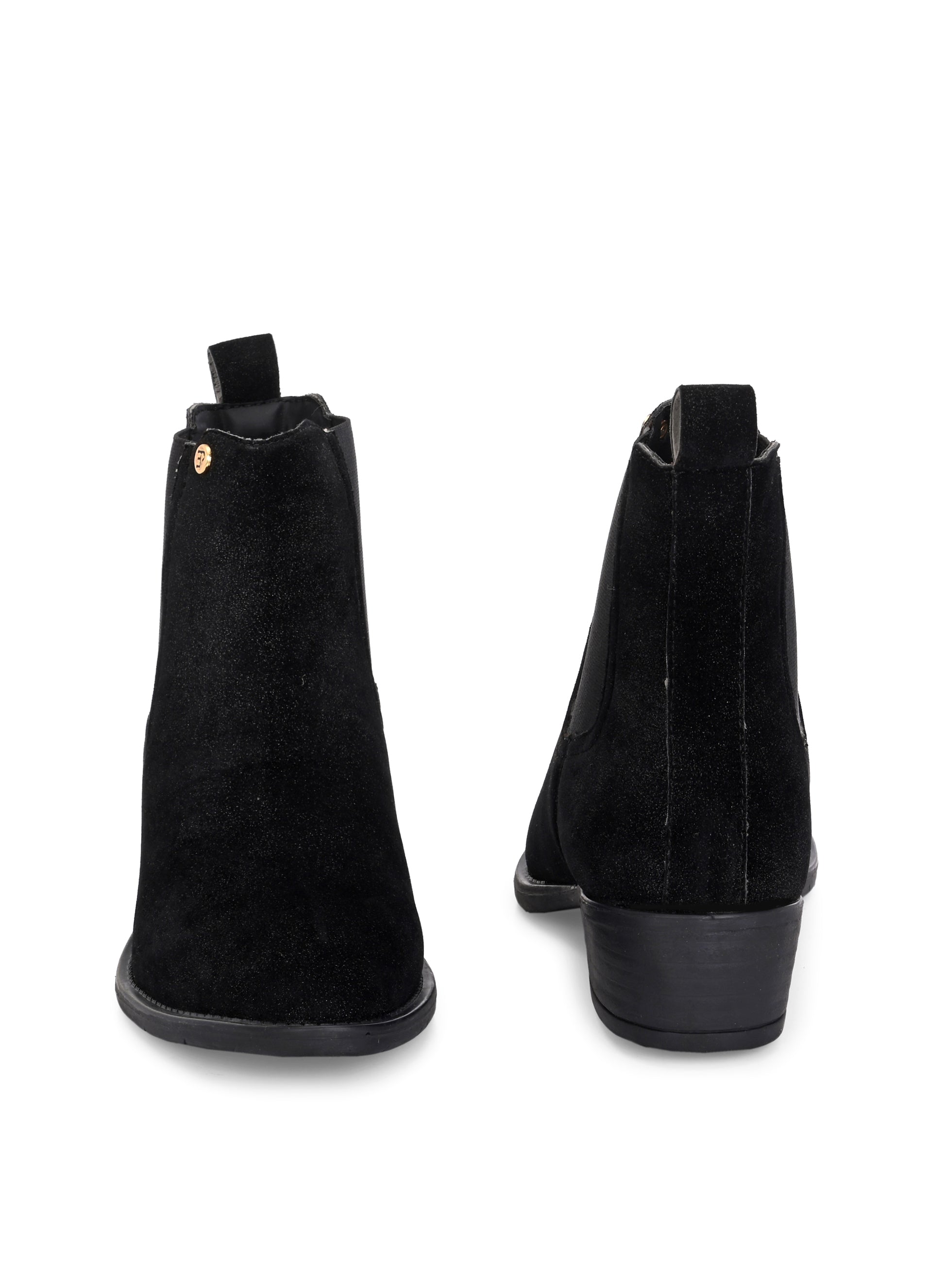 Charcoal suede slip-on boots with elastic side panels and a low block heel, featuring subtle gold detailing for a sleek, versatile look