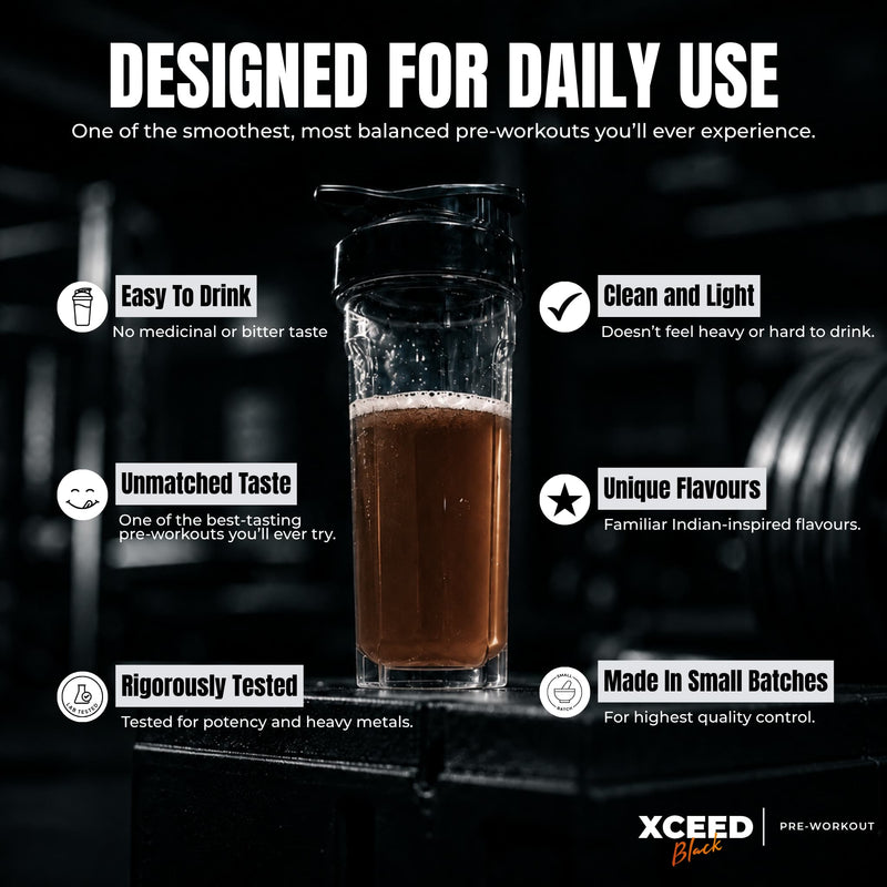 A pre-workout drink in a clear glass with a black lid, shown on a dark gym background with marketing text around it. The text reads 'DESIGNED FOR DAILY USE' and lists features like 'Easy To Drink,' 'Clean and Light,' 'Unmatched Taste,' 'Unique Flavours,' 'Rigorous Tested,' and 'Made in Small Batches.