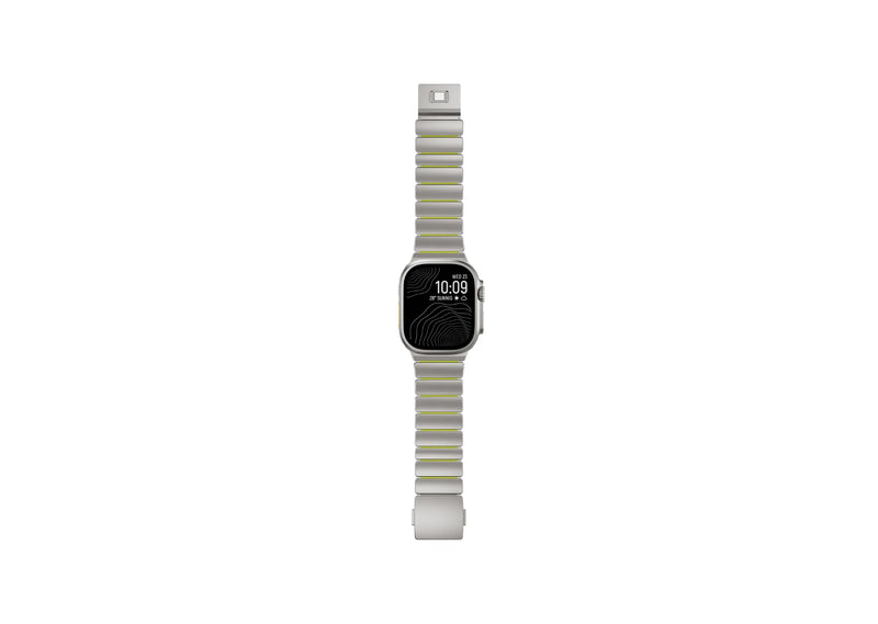 Side profile of Silver & Green Titanium Fusion Apple Watch Strap showcasing premium titanium links, silicone lining and magnetic closure