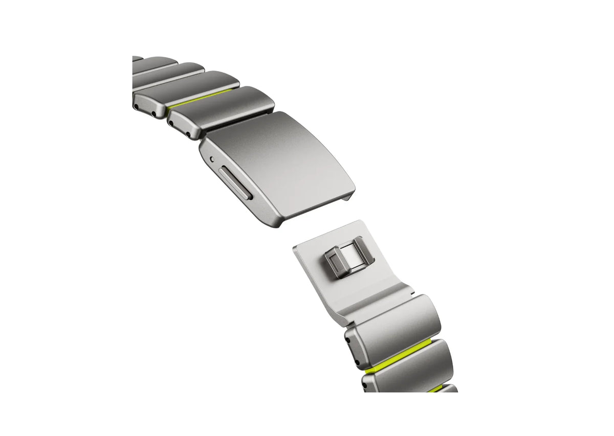 Detailed view of the premium titanium finish and soft green silicone interior of the Silver & Green Fusion Apple Watch Strap