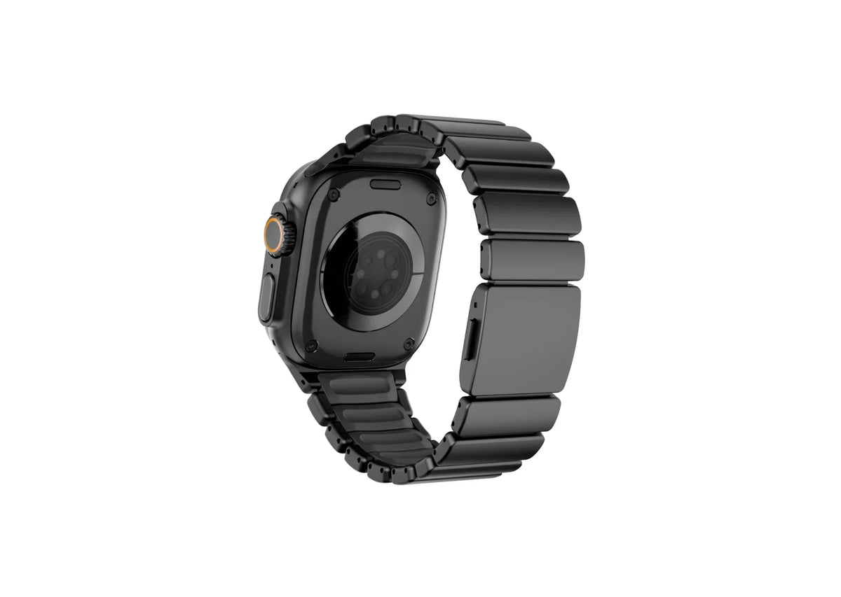 Royal Black Titanium Fusion Apple Watch Strap installed on Apple Watch Ultra featuring premium black titanium links, black silicone lining and secure magnetic closure