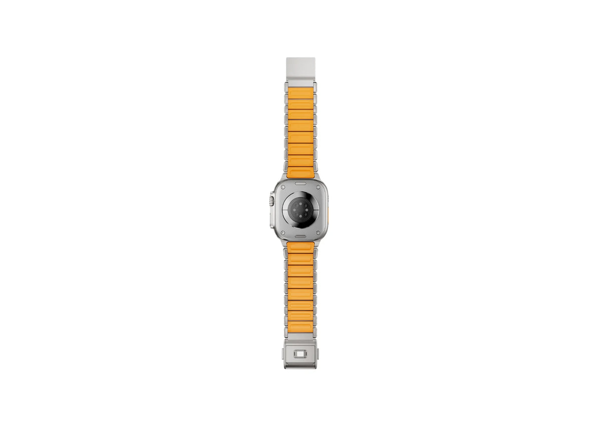 Silver & Orange Titanium Fusion Apple Watch Strap opened to display the powerful magnetic clasp, premium titanium frame and flexible silicone construction