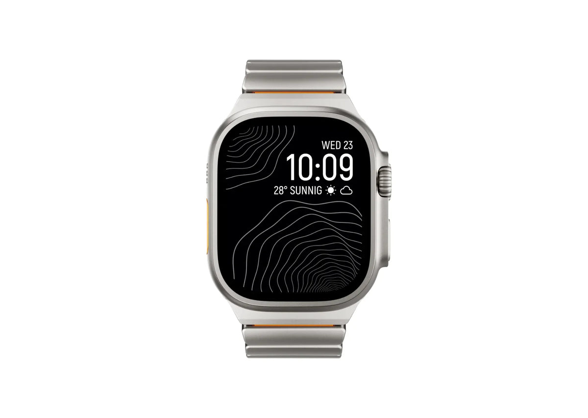 Silver & Orange Titanium Fusion Apple Watch Strap worn on Apple Watch Ultra delivering luxury styling, magnetic comfort and everyday durability