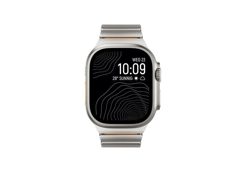 Silver & Orange Titanium Fusion Apple Watch Strap worn on Apple Watch Ultra delivering luxury styling, magnetic comfort and everyday durability