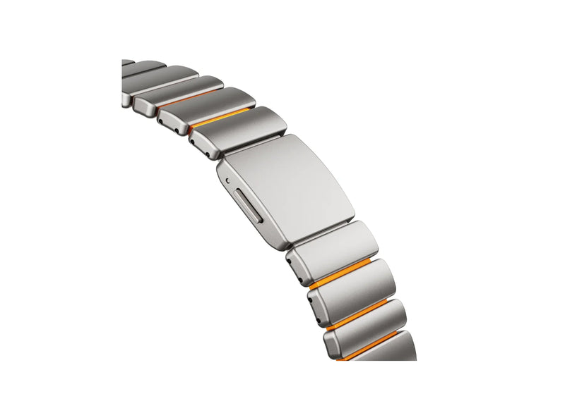 Side angle of the Silver & Orange Titanium Fusion Apple Watch Strap highlighting the brushed titanium finish and soft orange silicone interior