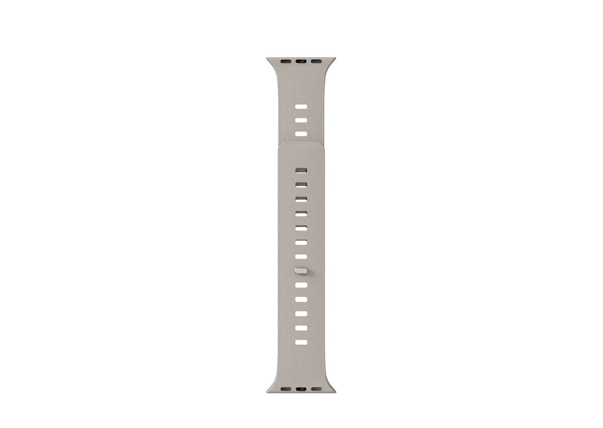 cream SnapBand Apple Watch strap showing the leather-textured silicone exterior and integrated magnetic pin closure