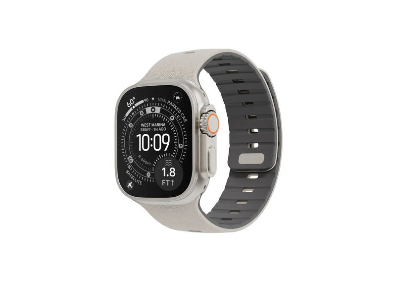 Apple Watch Ultra with cream and grey SnapBand silicone strap featuring a premium leather-like textured finish