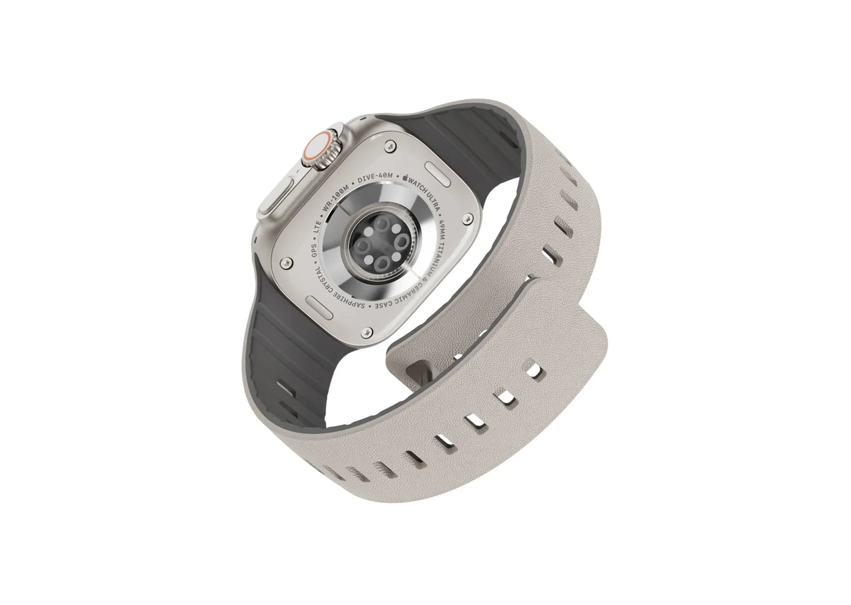 cream grey SnapBand silicone strap shown with Apple Watch Ultra, featuring a leather-like texture, black inner lining and magnetic closure