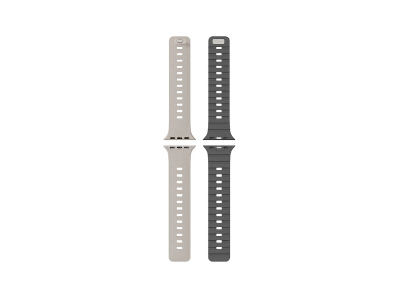 Side view of an Apple Watch Ultra with cream SnapBand silicone strap and grey textured inner lining