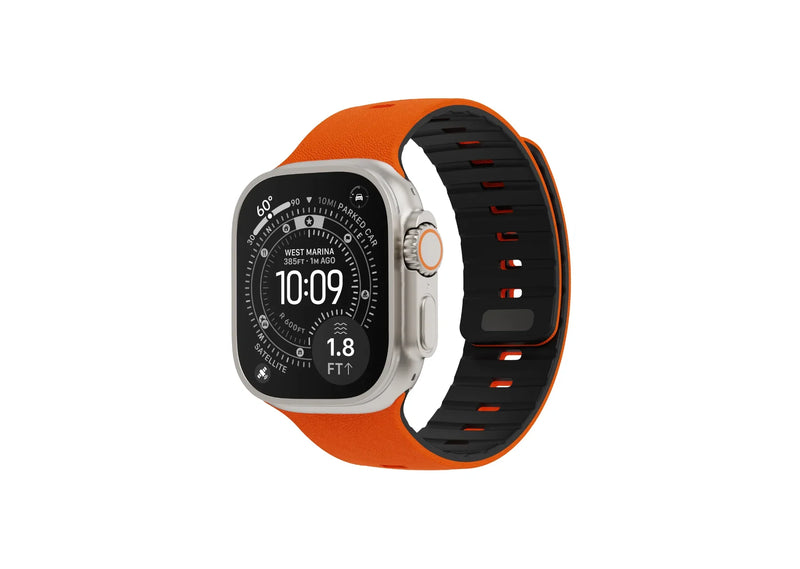 Apple Watch Ultra with orange and black SnapBand silicone strap featuring a premium leather-like textured finish