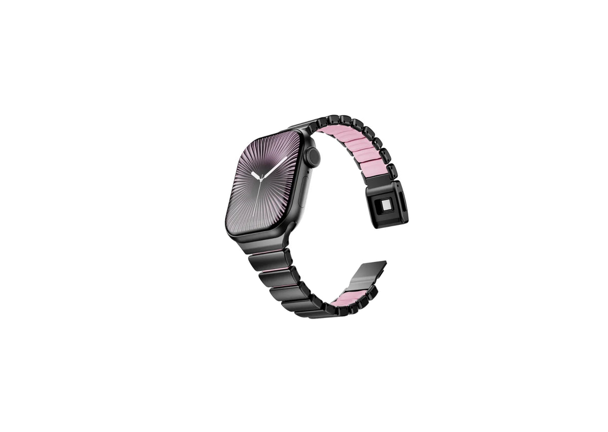 Black and pink Fusion stainless steel Apple Watch strap for women featuring premium stainless steel outer links, soft pink silicone comfort lining and secure butterfly clasp, compatible with Apple Watch Ultra 3, Ultra 2, Ultra, Series 11, Series 10, Series 9, Series 8 and Apple Watch SE.