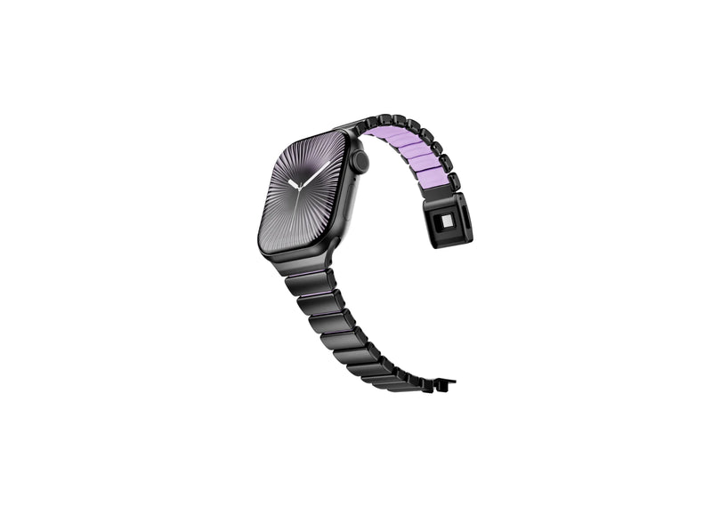 Luxury black stainless steel Apple Watch band with purple silicone comfort lining shown partially open, highlighting flexible construction and secure clasp for Apple Watch Ultra, Series 11 and Apple Watch SE.