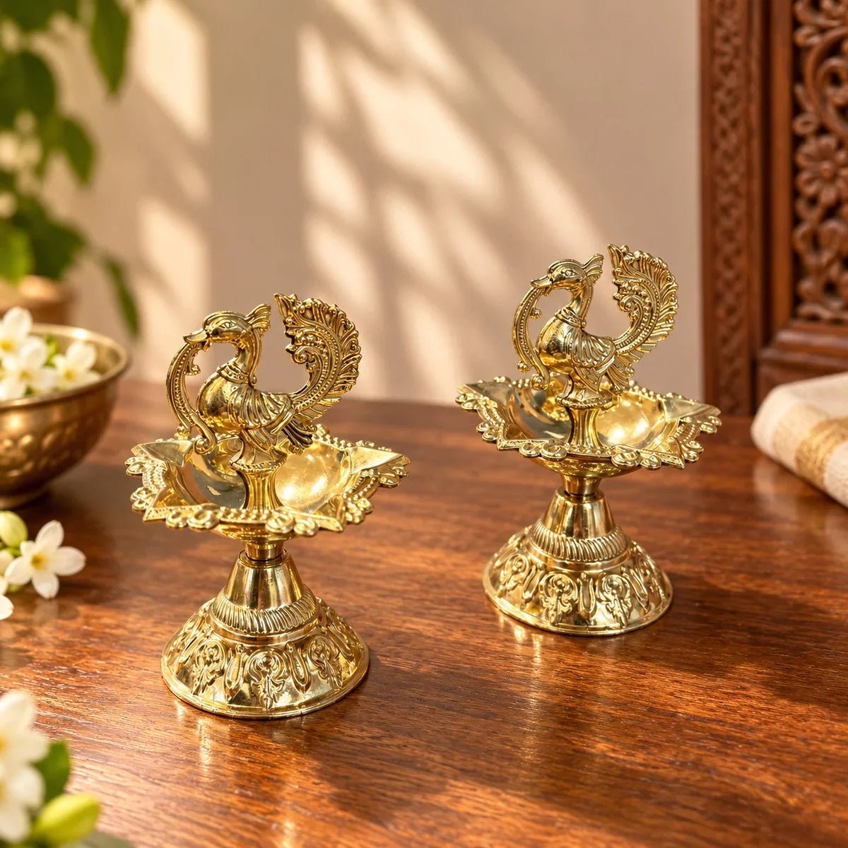 Brass Annam Diya Fancy Set of 2, swan-shaped oil lamps with scalloped tray and pedestal base. Zishta Festival Return Gifts.