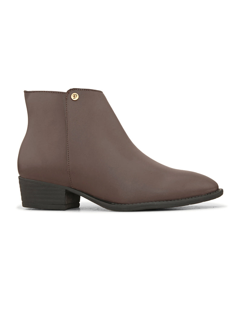 Brown leather boot with a pointed toe, side zipper, and low block heel.