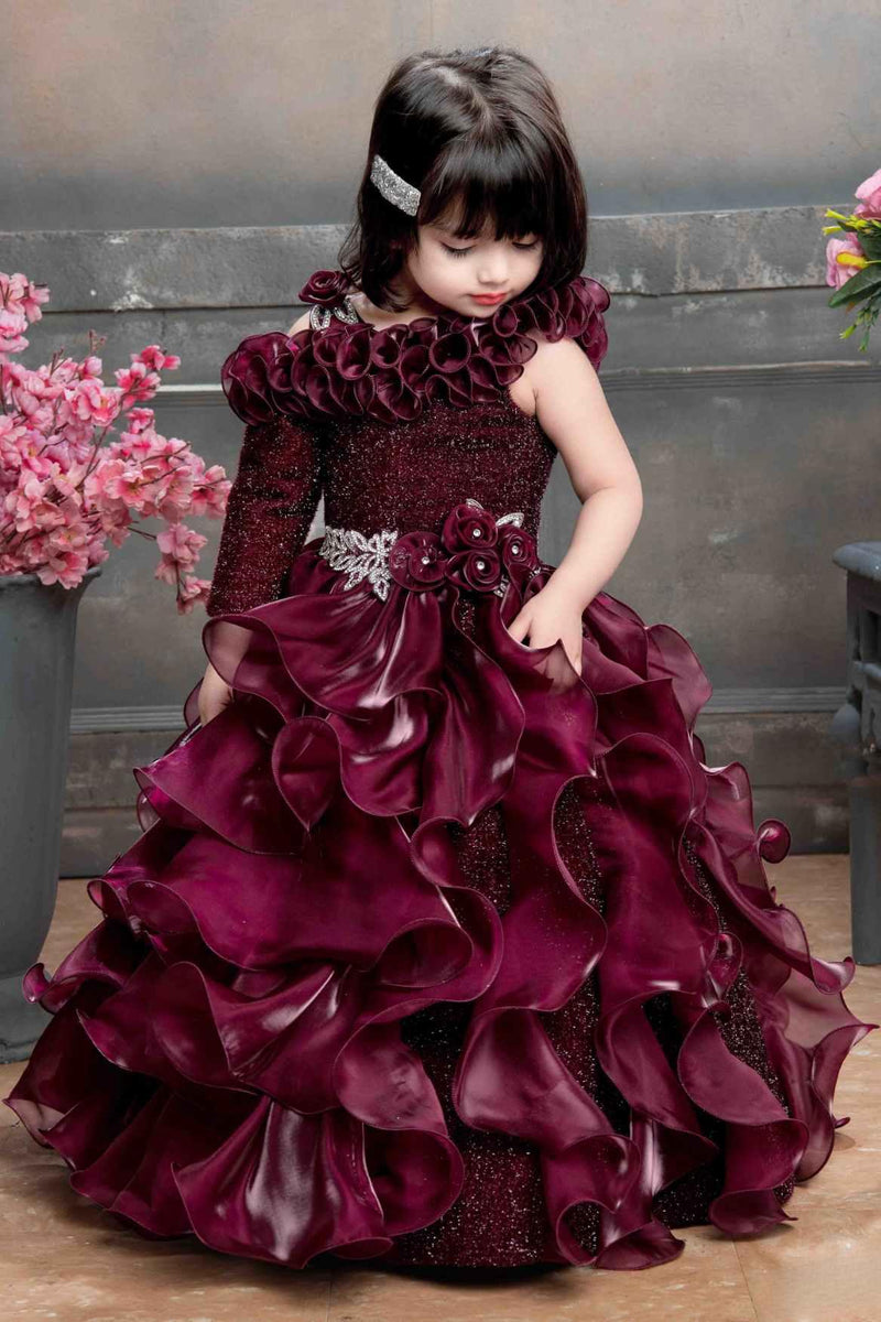 Designer Multilayer Ruffled Maroon Gown With Floral Embellishments For Girls