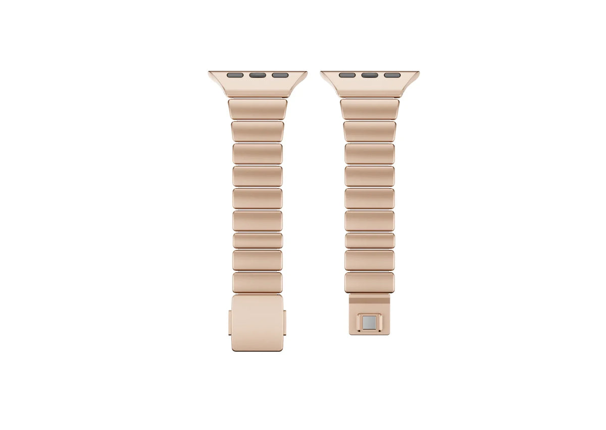 Luxury gold stainless steel Apple Watch band with ivory silicone inner lining shown partially open, highlighting flexible construction and secure butterfly clasp for Apple Watch Ultra 3, Series 11 and Apple Watch SE.