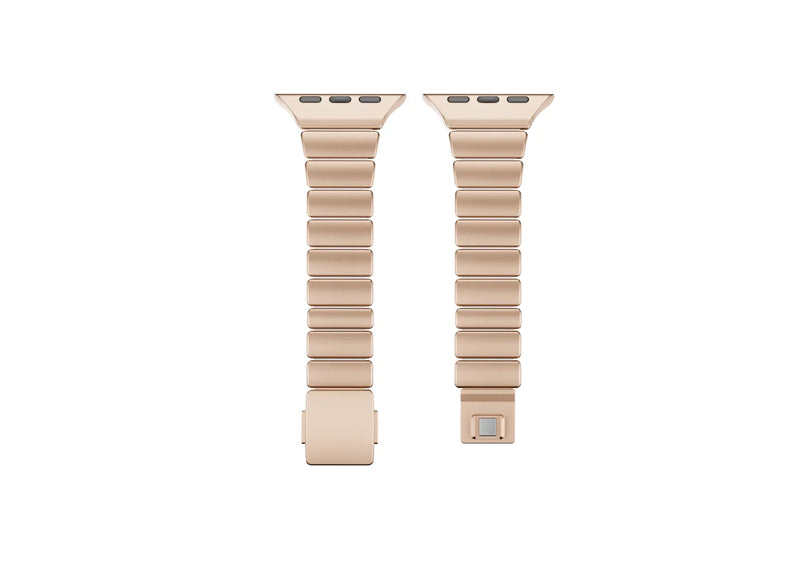 Luxury gold stainless steel Apple Watch band with ivory silicone inner lining shown partially open, highlighting flexible construction and secure butterfly clasp for Apple Watch Ultra 3, Series 11 and Apple Watch SE.