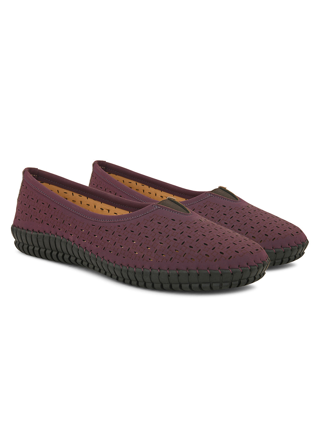 A comfortable maroon Laser-Cut Ballet Flat with a perforated design for breathability, featuring a black flexible sole and elastic detailing on the upper for a secure fit.
