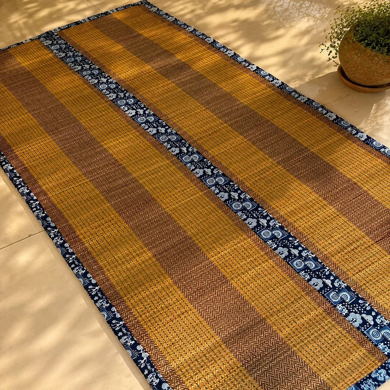 Madurkathi mat two fold with cushion in mustard weave and indigo border. Zishta Home Decor.