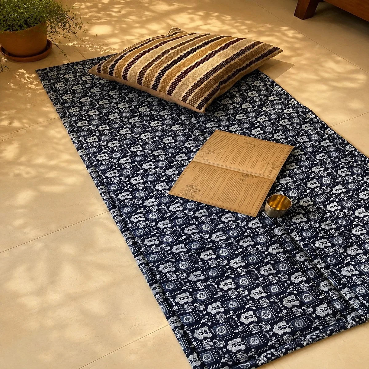 Madurkathi mat two fold reverse side in indigo block print with cushion. Zishta Home Decor.