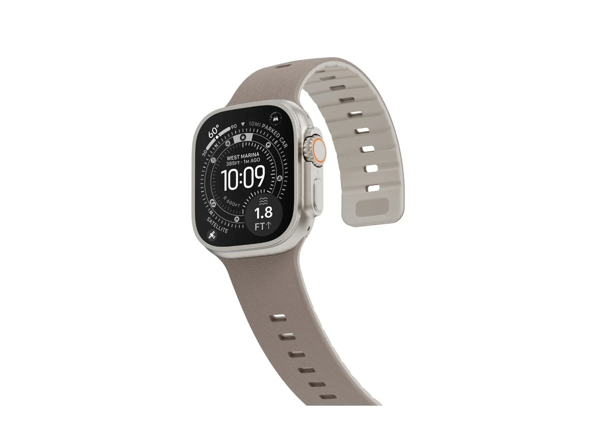 Misty Grey & Starlight Apple Watch strap fitted on Apple Watch Ultra with a textured silicone finish