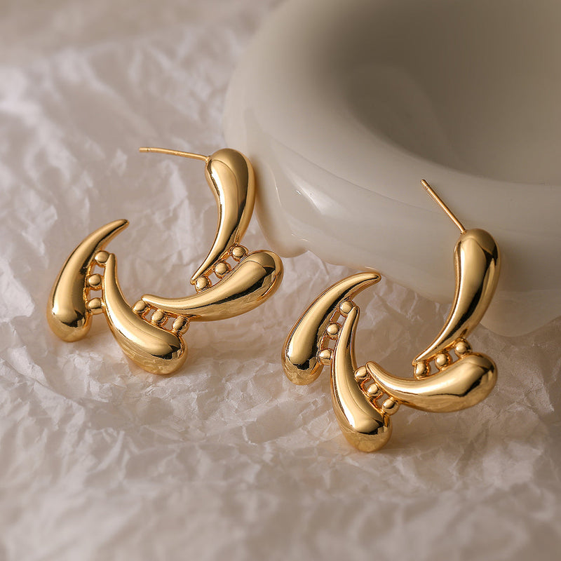 18K Gold Triple Stud Earrings Lifestyle Shot Women UniqueJewels.in