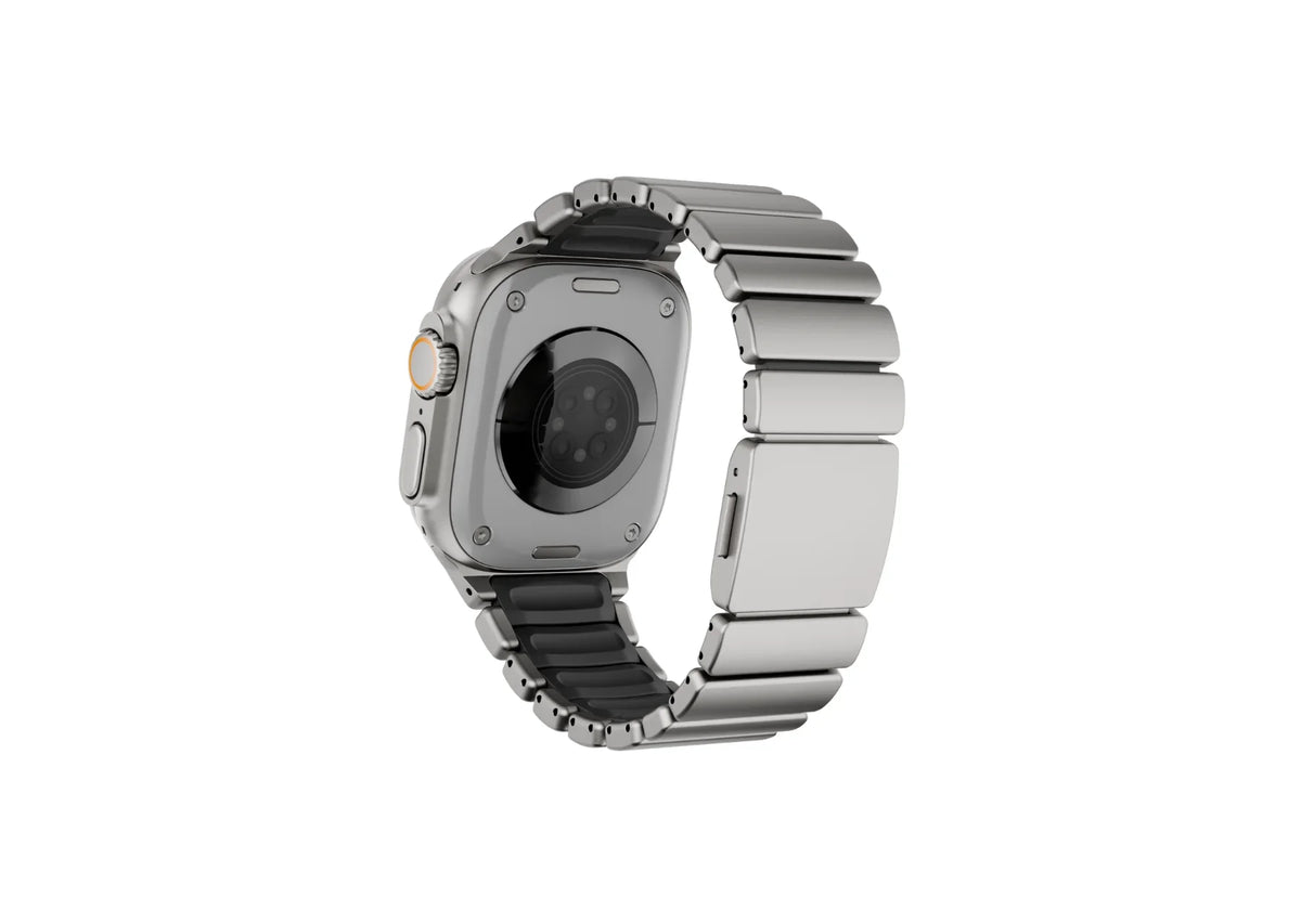 Silver & Black Titanium Fusion Apple Watch Strap installed on Apple Watch Ultra featuring premium silver titanium links, black silicone lining and secure magnetic closure
