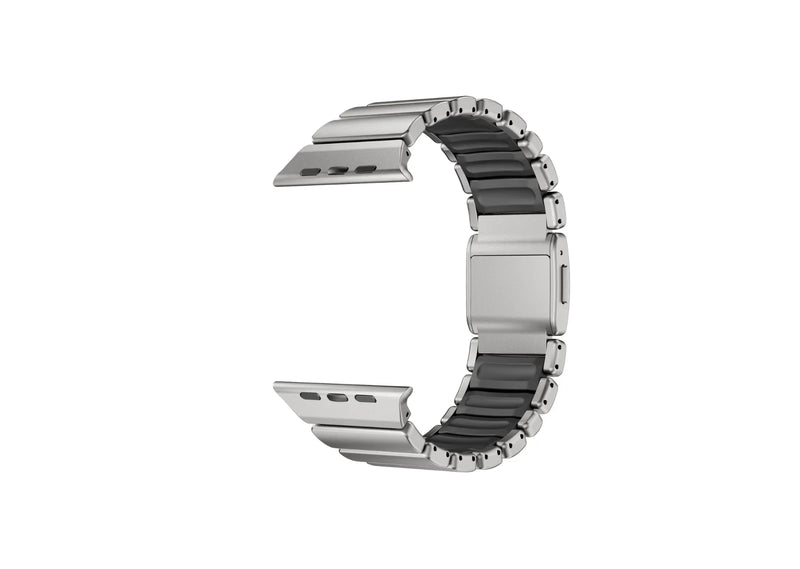 Detailed close-up of the magnetic locking system on the Silver & Black Titanium Fusion Apple Watch Strap with precision titanium hardware