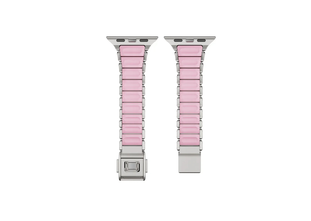 Detailed close-up of the butterfly clasp on the silver and pink Apple Watch strap showcasing premium stainless steel craftsmanship, precision engineering and secure locking mechanism.