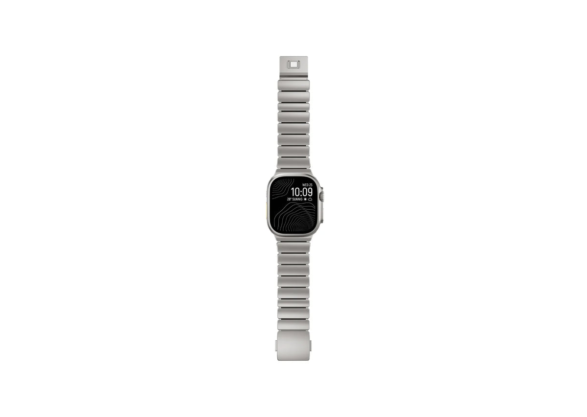 Side angle view of the Silver & Black Titanium Fusion Apple Watch Strap featuring brushed silver titanium links and soft silicone comfort