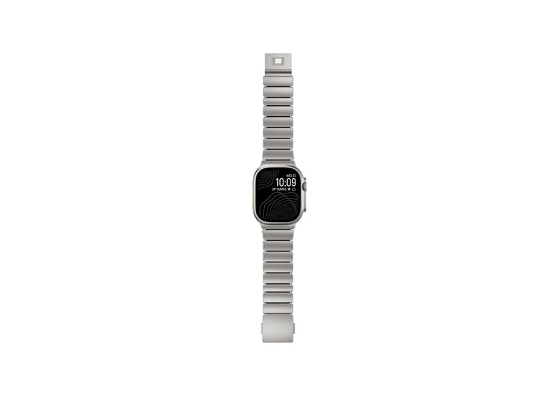 Side angle view of the Silver & Black Titanium Fusion Apple Watch Strap featuring brushed silver titanium links and soft silicone comfort